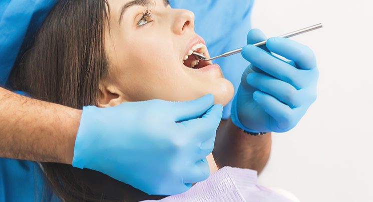 Blue nitrile examination gloves in dental care